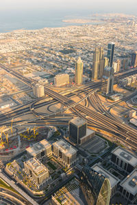 High angle view of buildings in city against sky