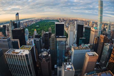 432 park avenue against cloudy sky in city