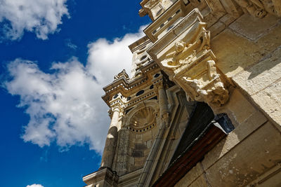 Low angle view of statue against sky