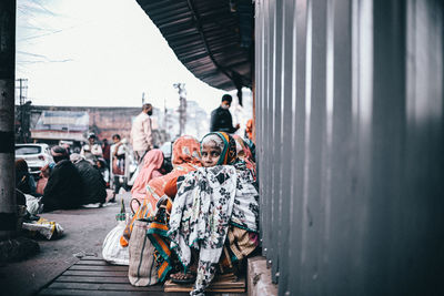 People on street in city