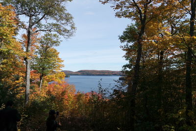 Scenic view of lake against sky during autumn