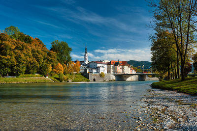 Bad tolz - picturesque resort town in bavaria, germany in autumn and isar river