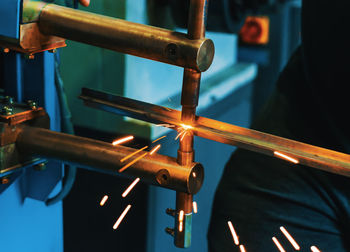 Close-up of man working at factory