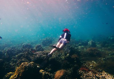 Man scuba diving in sea