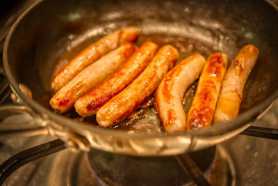 High angle view of meat in cooking pan