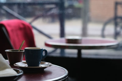 Close-up of coffee cup on table