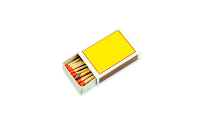 High angle view of multi colored pencils on white background