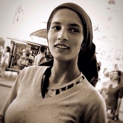 Portrait of woman standing outdoors