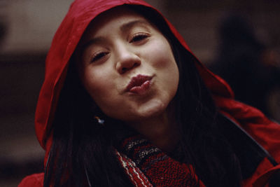 Close-up portrait of a serious young woman