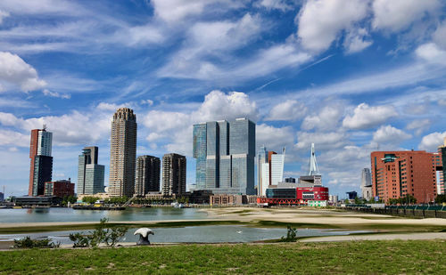 Modern buildings in city against sky