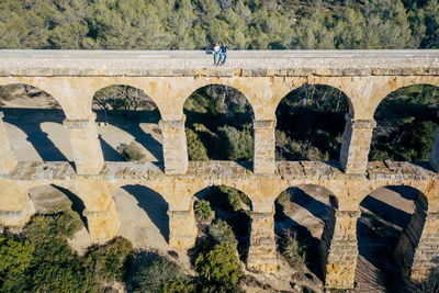 High angle view of les ferreres aqueduct against clear sky