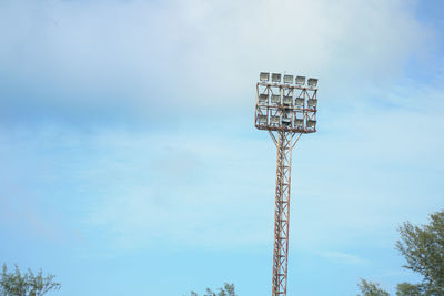 Low angle view of communications tower against sky