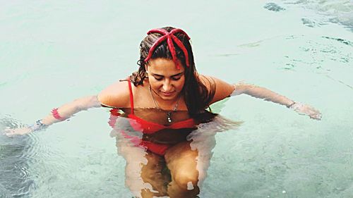 High angle view of girl playing in water