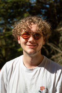 Portrait of young man wearing sunglasses