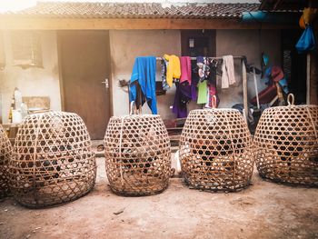 Various clothes hanging on wall 