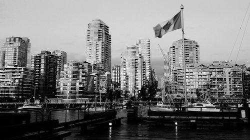 Buildings in city at dusk