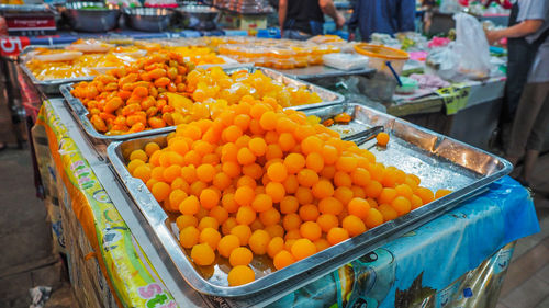 Various fruits for sale at market stall