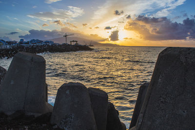 Scenic view of sea against sky during sunset