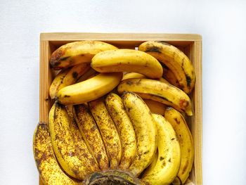 High angle view of bananas against white background