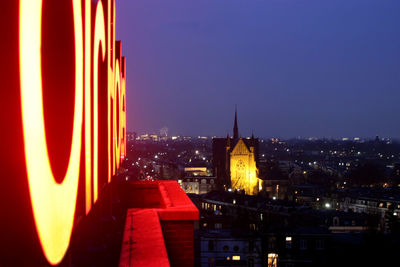 View of city lit up at night