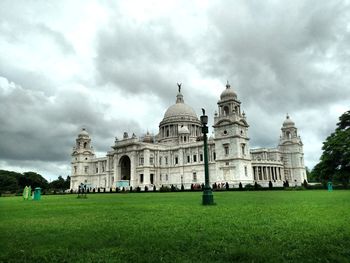 View of historical building against cloudy sky