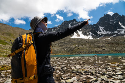 Rear view of woman looking at mountain