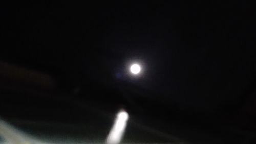 Scenic view of moon against sky at night