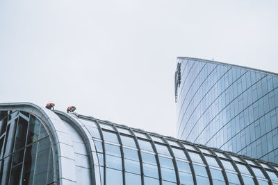 Low angle view of modern building against clear sky