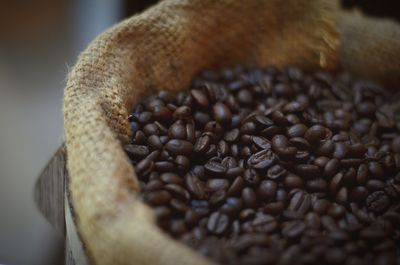 Close-up of coffee beans on table