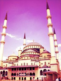 Low angle view of mosque against sky