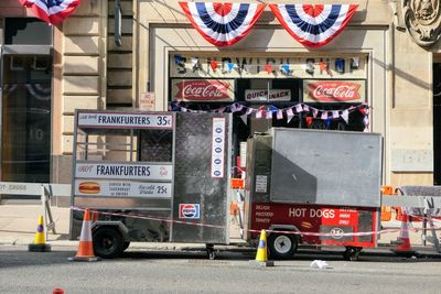 Side view of text on road against building