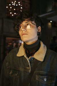 Portrait of young man looking away