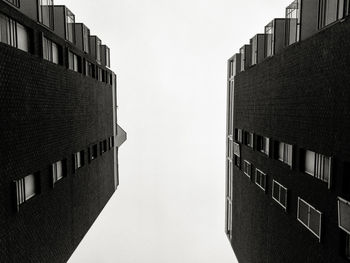 Low angle view of buildings against clear sky