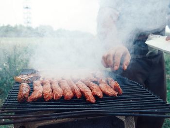 Close-up of meat on barbecue grill