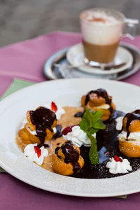 Close-up of breakfast served on table