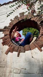 High angle view of girl sitting on floor