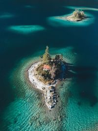High angle view of rocks in sea