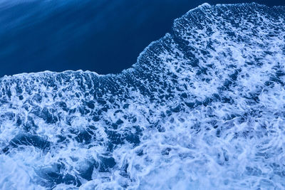 Sea waves splashing on rocks