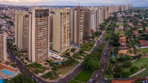 High angle view of street amidst buildings in city