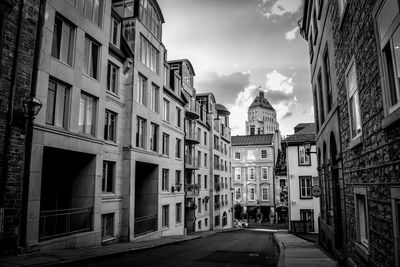 View of residential buildings against sky