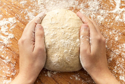 Low section of person preparing food on table