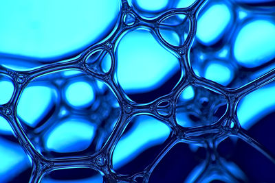 Full frame shot of  blue abstract background. soap foam macro close up. 
