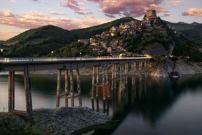 Bridge over river against sky