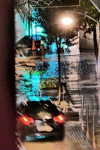 Wet street in city during rainy season