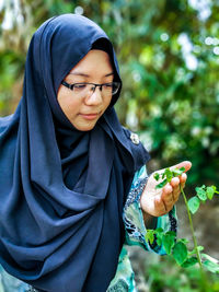 Portrait of woman wearing eyeglasses