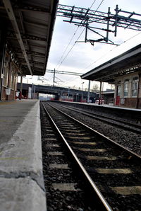 Railroad tracks on railroad station platform