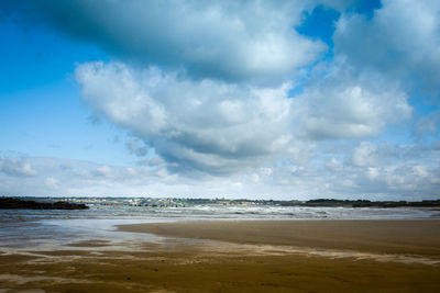 Scenic view of beach against sky