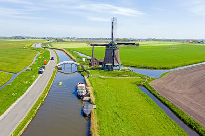 Aerial from the obdammer windmill in the countryside from the netherlands