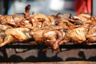 Close-up of meat on barbecue grill