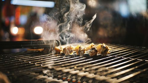 Close-up of meat on barbecue grill